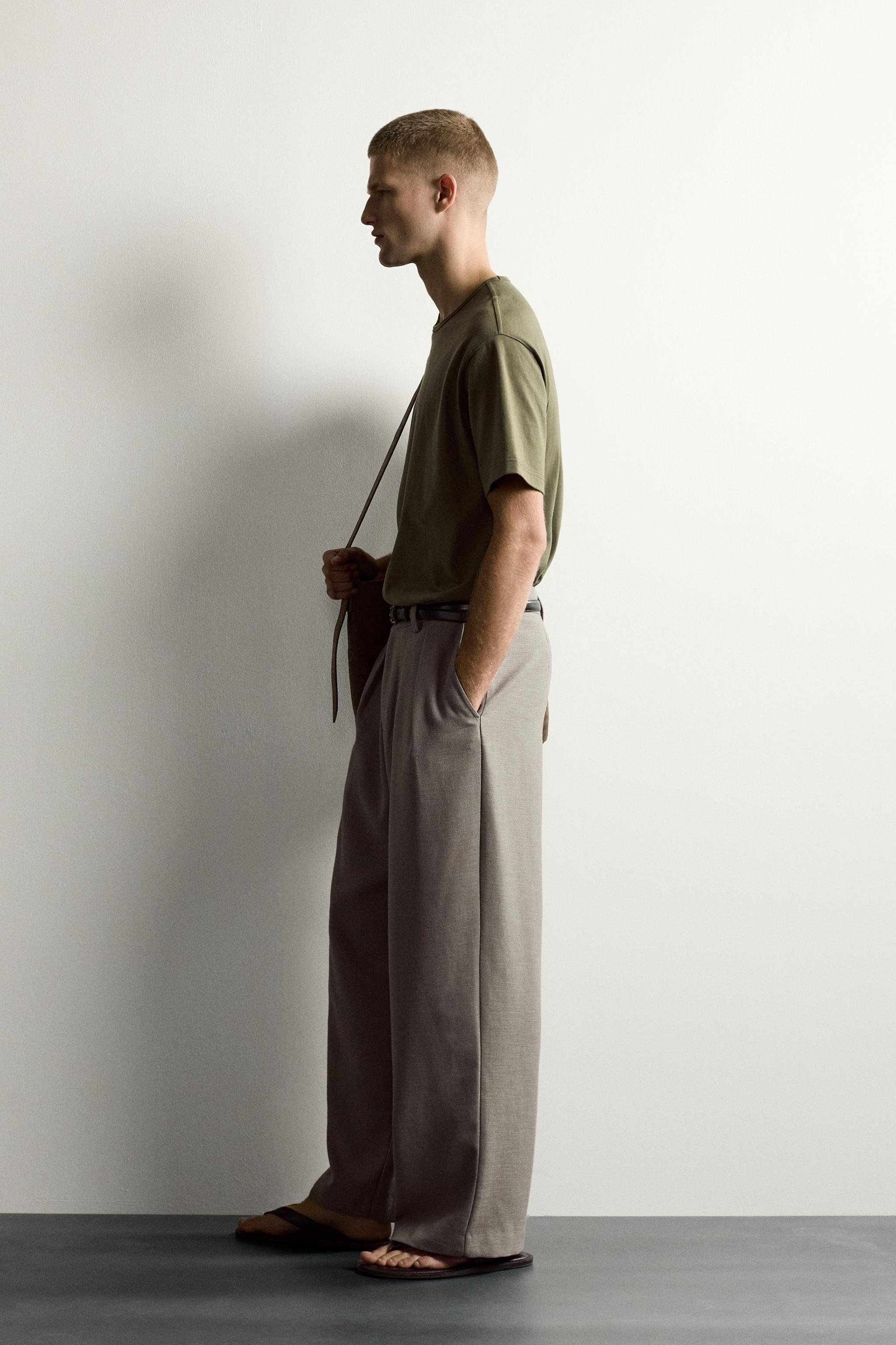 RELAXED FIT STRUCTURED PLEATED PANTS